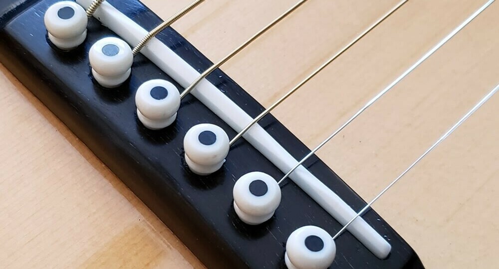 Acoustic Saddle - Strung Guitars